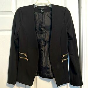 Black blazer with gold zipper detail